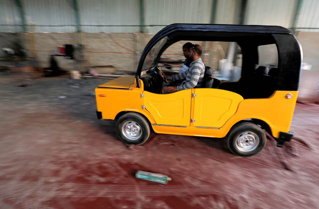 A worker makes a test for new ‘Mini-Car-Egypt’ car in s workshop, near Egypt’s pyramids of Giza, in Kerdasa, Egypt, on Wednesday (Reuters photo)